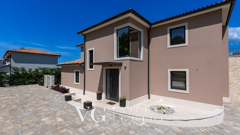 Villa Faloniga Garden and property exterior