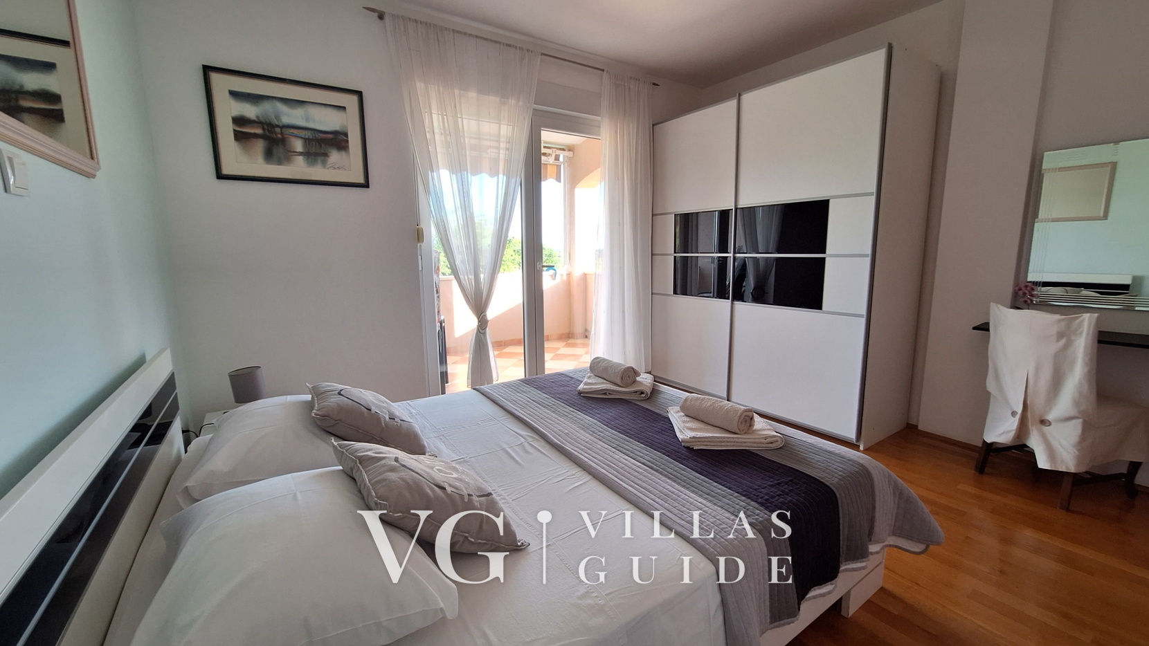 Villa Oaza Camera da letto