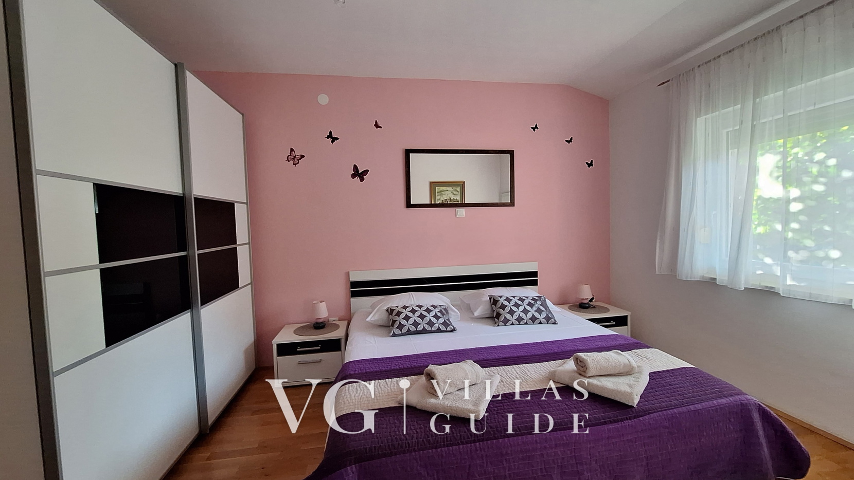 Villa Oaza Camera da letto