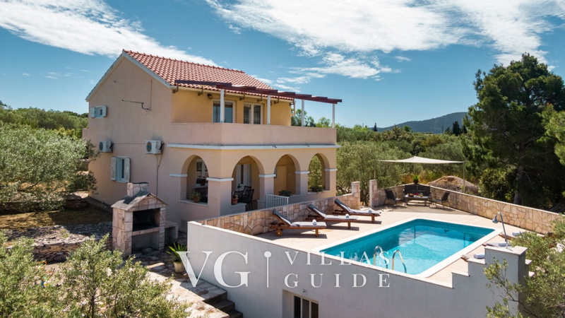 Holiday home SUNSET Garden and property exterior