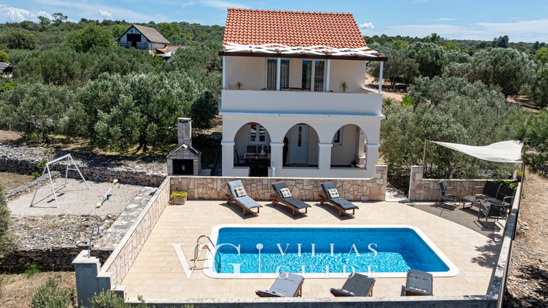 Holiday home SUNSET Garden and property exterior