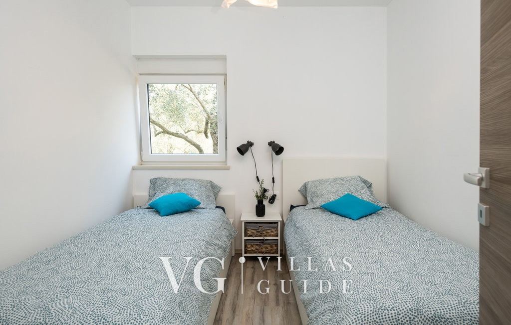 Holiday home Lara in olive garden with jacuzzi Bedroom