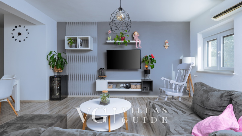 Holiday home Lara in olive garden with jacuzzi Living room