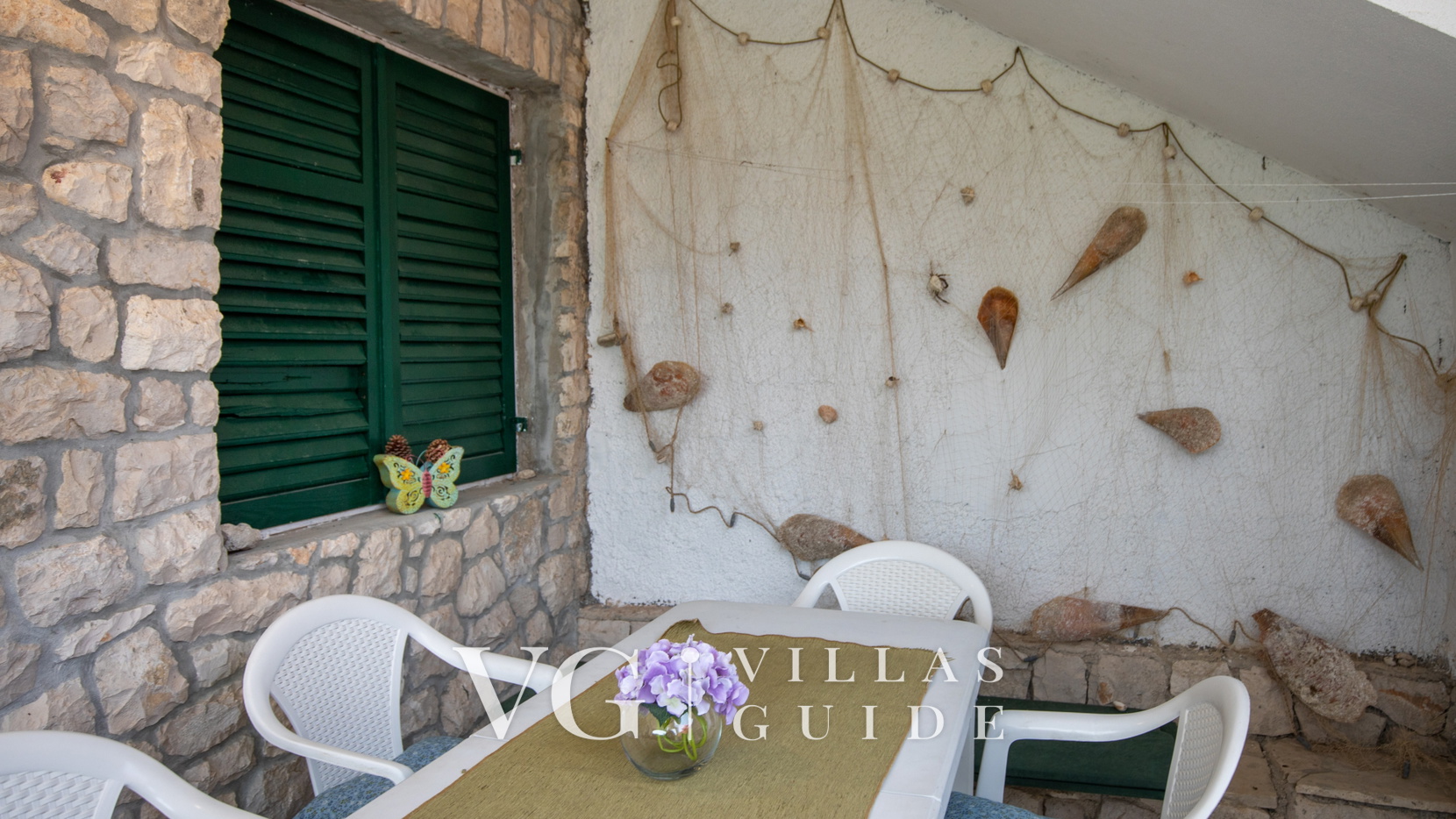 Apartman Mara Garden and property exterior