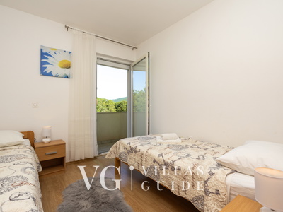 Holiday home Neda Schlafzimmer