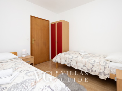 Holiday home Neda Schlafzimmer