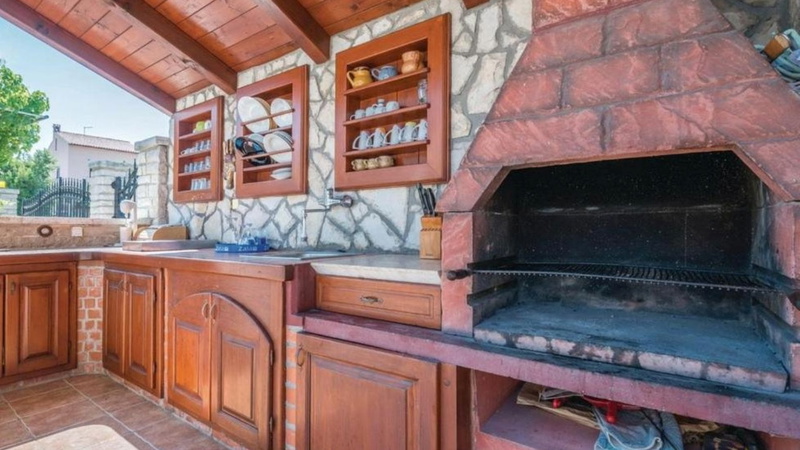 Apartment Biserka with shared pool