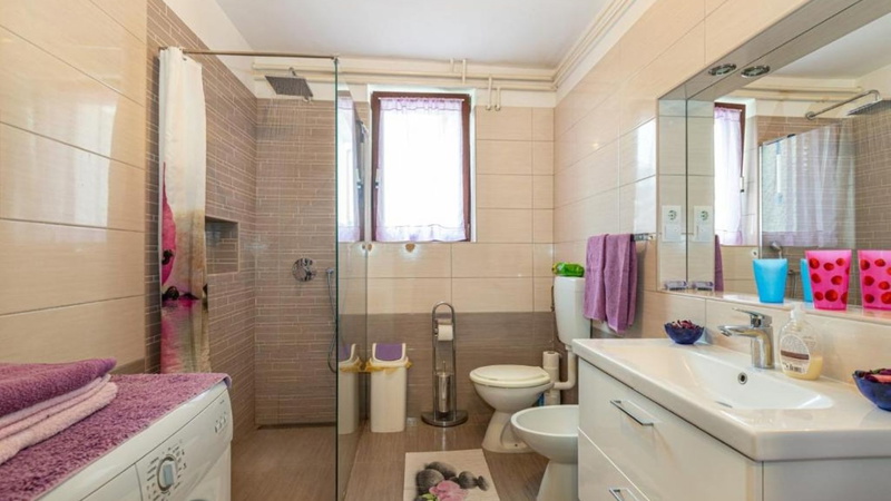 Apartment Biserka with shared pool