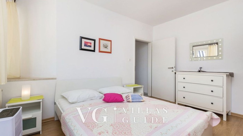 Apartment with pool Lucia Camera da letto