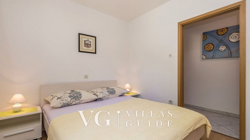 Apartment with pool Lucia Camera da letto